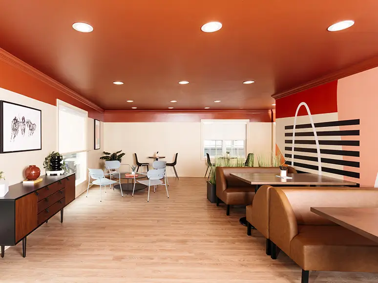 Lounge with booth seating and café tables